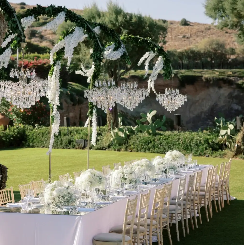 Outdoor wedding reception estate lighting decoration with chandeliers Athens